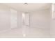 Bright, freshly painted bedroom featuring modern doors and ample closet space at 444 Edgewood Rd, Venice, FL 34293