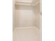 Empty walk-in closet with built-in storage at 444 Edgewood Rd, Venice, FL 34293