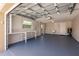 The spacious garage features an epoxy floor, work bench, and utility sink, offering both functionality and convenience at 444 Edgewood Rd, Venice, FL 34293