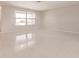 Bright living room with large window at 444 Edgewood Rd, Venice, FL 34293