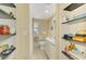 Efficient bathroom featuring a shower, toilet, and a sink with vanity at 4511 Wilkinson Rd, Sarasota, FL 34233