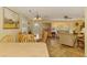Cozy dining room featuring an open floor plan and a rustic chandelier and tile flooring at 4511 Wilkinson Rd, Sarasota, FL 34233