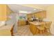 Spacious kitchen featuring wood cabinets, stainless steel appliances, and tiled floors at 4511 Wilkinson Rd, Sarasota, FL 34233