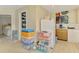 Open kitchen area, featuring appliances and storage at 4511 Wilkinson Rd, Sarasota, FL 34233