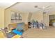Versatile space with seating, desk, and storage at 4511 Wilkinson Rd, Sarasota, FL 34233