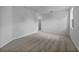 Spacious bedroom with plush carpet and a window providing natural light at 1057 Presque Isle Dr, Port Charlotte, FL 33952
