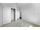 Bedroom with closet and neutral carpet at 1057 Presque Isle Dr, Port Charlotte, FL 33952