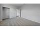 Bedroom features neutral walls, carpet, closet and a view to another room at 1057 Presque Isle Dr, Port Charlotte, FL 33952