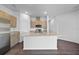 A modern kitchen featuring stainless steel appliances, granite countertops, and wood cabinets at 1057 Presque Isle Dr, Port Charlotte, FL 33952