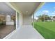 View from covered patio to backyard and kitchen at 1057 Presque Isle Dr, Port Charlotte, FL 33952