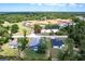 Expansive aerial shot of neighborhood homes and lush green surroundings at 12123 Platano Dr, Punta Gorda, FL 33955