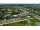 Scenic aerial shot showcasing canal-front homes amidst lush vegetation and waterways at 13471 Chenille Dr, Port Charlotte, FL 33981