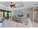 Comfortable living room with stylish furniture and easy access to the outdoor pool area at 13471 Chenille Dr, Port Charlotte, FL 33981