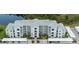 Beautiful condo complex with modern architecture, lush landscaping, and convenient parking at 14141 Heritage Landing Blvd # 912, Punta Gorda, FL 33955