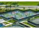 Aerial view of the community offering a glimpse of the tennis courts and pathways at 14141 Heritage Landing Blvd # 912, Punta Gorda, FL 33955