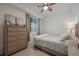 Cozy bedroom with neutral tones and a large window at 14141 Heritage Landing Blvd # 912, Punta Gorda, FL 33955