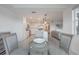 Open-concept kitchen and dining area with modern lighting and stainless steel appliances at 14141 Heritage Landing Blvd # 912, Punta Gorda, FL 33955