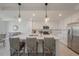 Modern kitchen with stainless steel appliances and a large center island with seating at 14141 Heritage Landing Blvd # 912, Punta Gorda, FL 33955