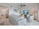 Cozy living room with stylish decor, comfortable seating, and a view of a serene landscape displayed on the television at 14141 Heritage Landing Blvd # 912, Punta Gorda, FL 33955