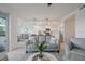 Stylish living room showcases a comfortable seating arrangement and open-concept design leading into the modern kitchen at 14141 Heritage Landing Blvd # 912, Punta Gorda, FL 33955