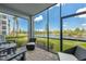 Relaxing screened patio with comfortable seating and serene water views at 14141 Heritage Landing Blvd # 912, Punta Gorda, FL 33955