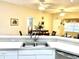 View from the kitchen over the breakfast bar to the dining and living areas at 1431 Red Oak Ln, Port Charlotte, FL 33948