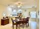 Comfortable dining area with tile flooring conveniently located near the kitchen at 1431 Red Oak Ln, Port Charlotte, FL 33948