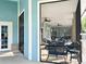 Inviting screened patio showcases comfortable seating and a relaxing atmosphere at 1431 Red Oak Ln, Port Charlotte, FL 33948