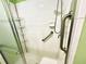 Accessible shower featuring grab bars, a shower seat, and ample space at 1431 Red Oak Ln, Port Charlotte, FL 33948