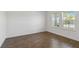 Bedroom with wood floors and natural light at 16824 Canopy Garden Dr, Port Charlotte, FL 33953