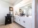 Bathroom featuring a double vanity, and stylish decor at 17150 Sarong Ln, Punta Gorda, FL 33955