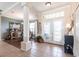 Welcoming foyer featuring tile floors, decorative columns, and an open view to the dining area at 17150 Sarong Ln, Punta Gorda, FL 33955