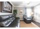 Inviting living room with neutral paint, comfortable seating, and attractive decor at 17150 Sarong Ln, Punta Gorda, FL 33955