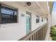 Balcony view with the unit number 625 and the green door at 175 Kings Hwy # 625, Punta Gorda, FL 33983