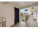 Hallway featuring elevator, a view of the palm trees and the property grounds at 175 Kings Hwy # 625, Punta Gorda, FL 33983