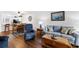Cozy living room with ceiling fan, dining table, and blue furnishings at 175 Kings Hwy # 625, Punta Gorda, FL 33983