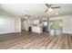Bright and open floorplan with modern kitchen, hardwood floors and plenty of natural light at 18178 Wolbrette Cir, Port Charlotte, FL 33948
