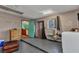 Versatile basement area featuring laundry facilities, additional storage, and access to the kitchen at 2031 Backton St, Port Charlotte, FL 33948