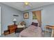 Relaxing bedroom featuring ample natural light, comfortable seating, and a calming atmosphere at 2031 Backton St, Port Charlotte, FL 33948