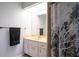 Bathroom featuring vanity, shower with curtain, and modern fixtures at 21220 Pemberton Ave, Port Charlotte, FL 33952