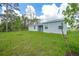 Large backyard offering plenty of space for outdoor activities and landscaping at 2138 Blaser St, Punta Gorda, FL 33980