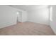 Spacious carpeted bedroom with ensuite bathroom access at 2138 Blaser St, Punta Gorda, FL 33980