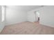 Large carpeted bedroom with ensuite bathroom access at 2138 Blaser St, Punta Gorda, FL 33980