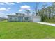 Beautiful home with modern design, well-manicured lawn, and inviting curb appeal at 2138 Blaser St, Punta Gorda, FL 33980