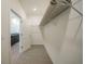 Walk-in closet with carpet and metal shelving at 2138 Blaser St, Punta Gorda, FL 33980