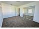 A bedroom features neutral carpeting and a sliding mirror closet door at 21899 Cellini Ave, Port Charlotte, FL 33952
