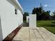 Exterior view of the property, showing a patio area and outdoor space at 21899 Cellini Ave, Port Charlotte, FL 33952