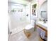 The bathroom features a glass-enclosed shower and modern fixtures, creating a sleek and stylish space at 22334 Augusta Ave, Port Charlotte, FL 33952