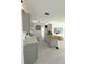 Updated kitchen featuring gray cabinets, butcher block countertops, and modern appliances at 22334 Augusta Ave, Port Charlotte, FL 33952