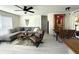 This airy living room offers ample natural light, modern décor, and a cozy seating area at 22334 Augusta Ave, Port Charlotte, FL 33952